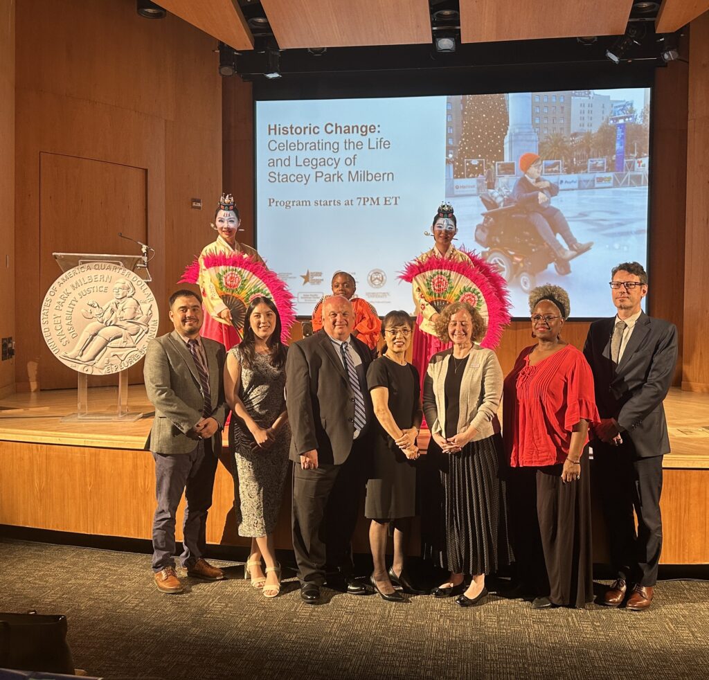 Stacey Park Milbern's family, program partners, and two traditional Korean fan dancers at the event