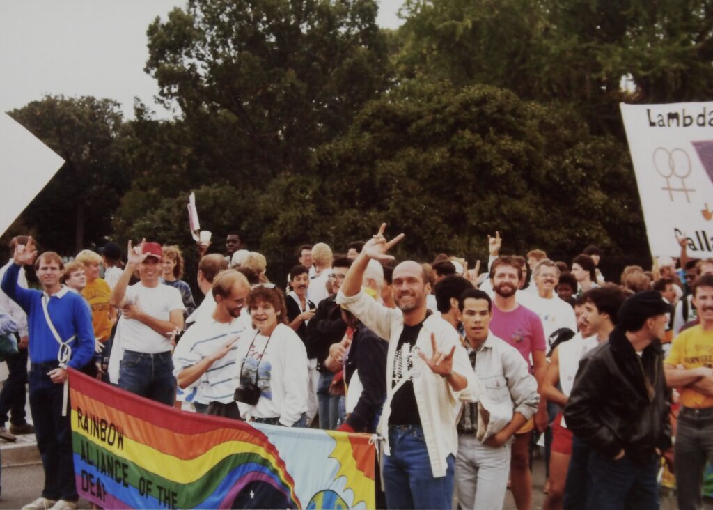 Photo of protestors signing at the 1987 March on Washington for Lesbian and Gay Rights