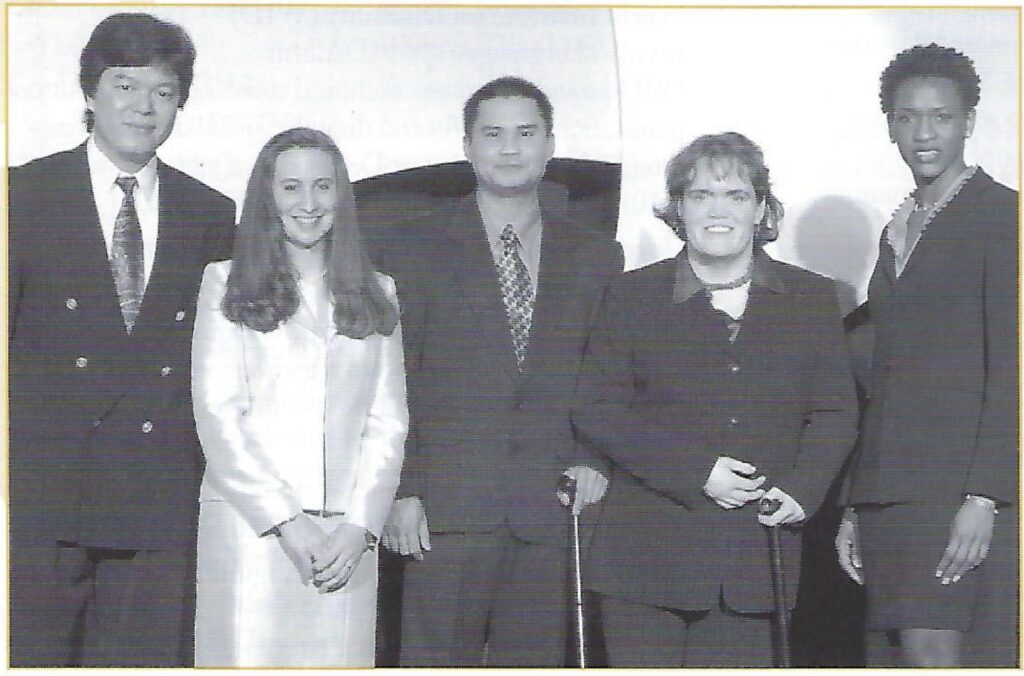 A black-and-white photo of the 2002 Paul G. Hearne Award recipients: (from left to right) Albert Cheong, Sarah Louise Triano, Peter Cody Hunt, Carrie Griffin and Claudia Gordon.